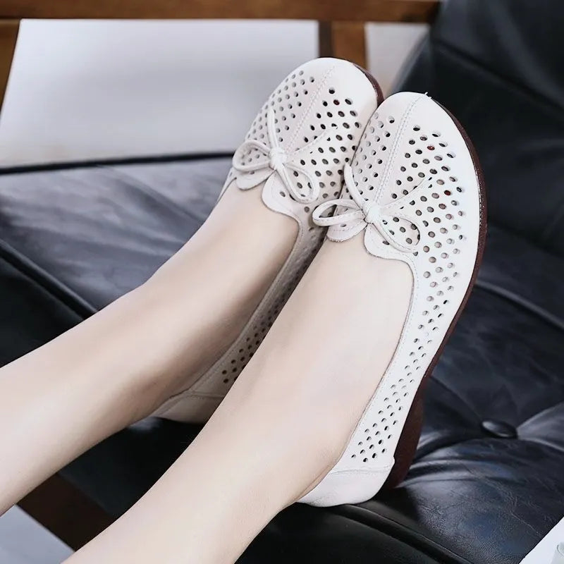 Zapatos huecos suaves y cómodos de suela plana