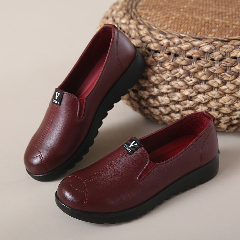 Zapatos de cuero con suela blanda en forma de V