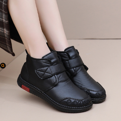 Zapatos de madre engrosados de invierno y botas de algodón.
