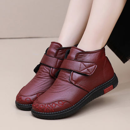 Zapatos de madre engrosados de invierno y botas de algodón.