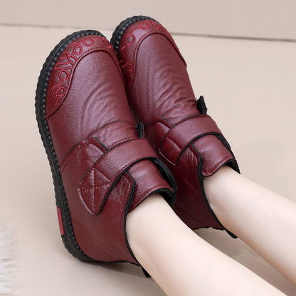 Zapatos de madre engrosados de invierno y botas de algodón.