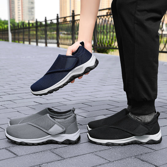 Zapatos masculinos nueva superficie de la red en primavera zapatos casuales transpirables convenientes pegatinas mágicas zapatos para ancianos
