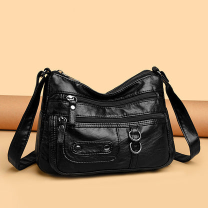 Bolso de piel con doble anilla
