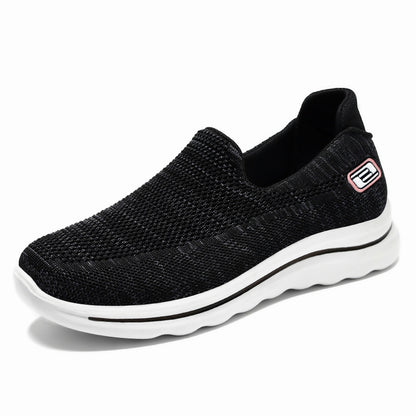 Los zapatos de las madres de mediana edad y ancianos pedalean zapatos de los ancianos con suelas planas, zapatos de las mujeres de la marca de fideos tejidos voladores con suelas suaves antideslizantes.