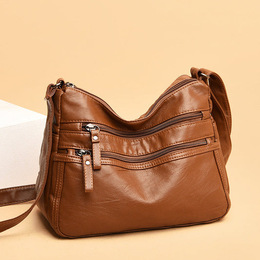 Bolso de piel de color liso