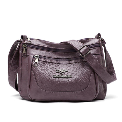 Bolso bandolera de piel suave estampada