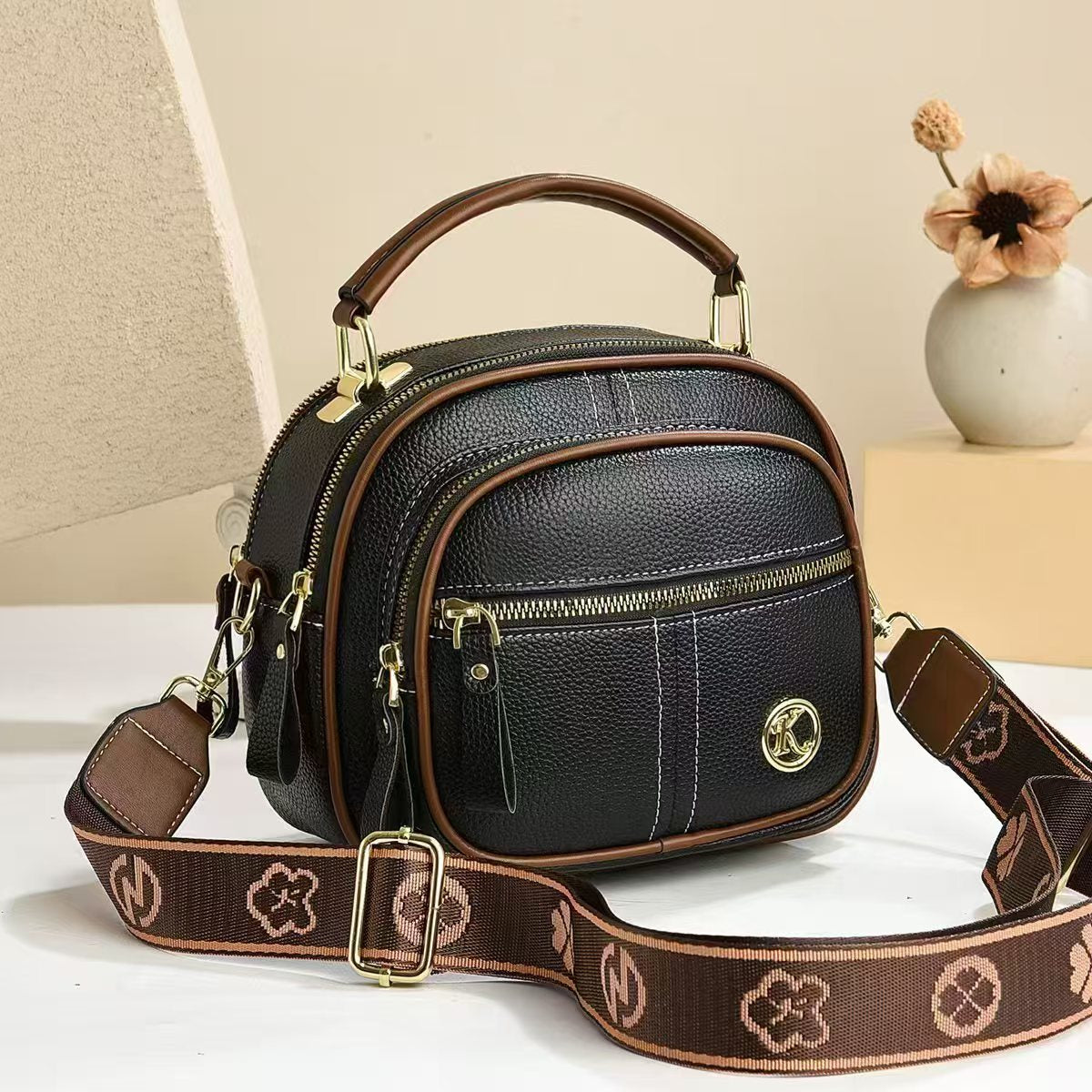 Bolso bandolera y de hombro popular de cuero