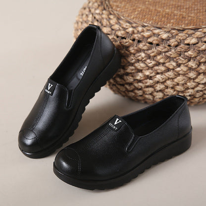 Zapatos de cuero con suela blanda en forma de V