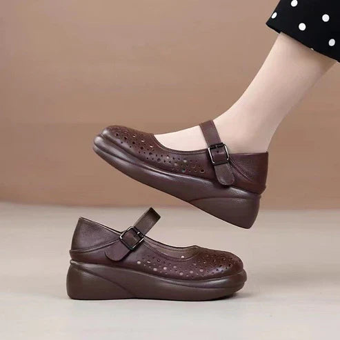 Crocs de punta redonda de cuero genuino