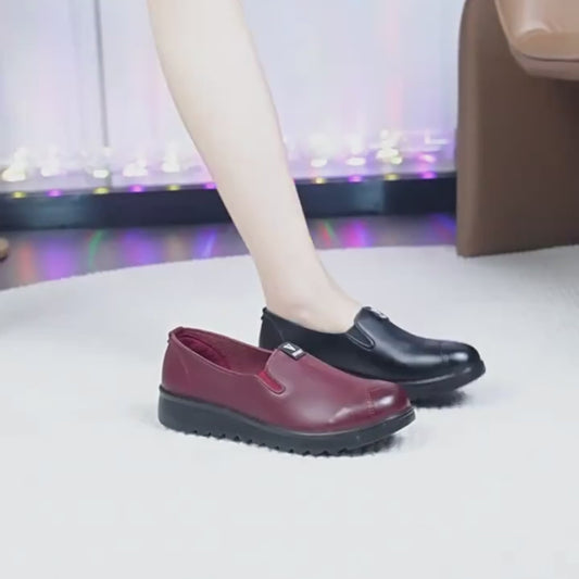 Zapatos de cuero con suela blanda en forma de V